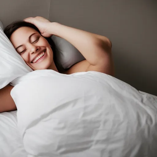 

A woman lying in bed, peacefully sleeping, with a smile on her face.